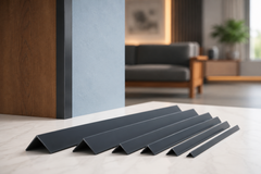 Anthracite PVC angle trim finishing a modern grey kitchen corner