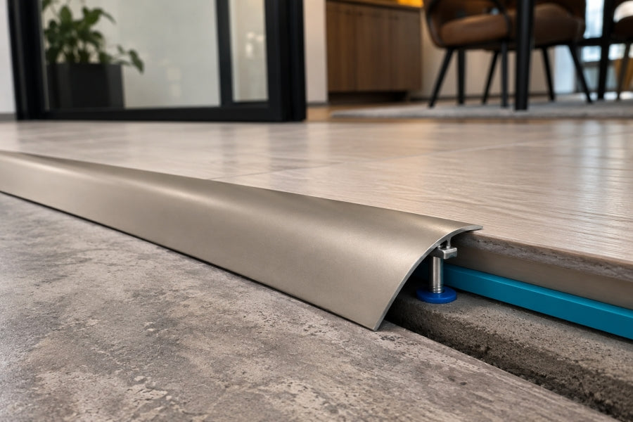 Aluminium door threshold strip cut to length with a fine tooth hacksaw