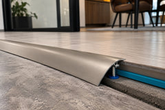 Aluminium door threshold strip cut to length with a fine tooth hacksaw