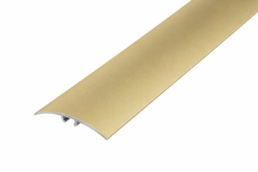 Gold aluminium door threshold strip 40mm covering a carpet to laminate join